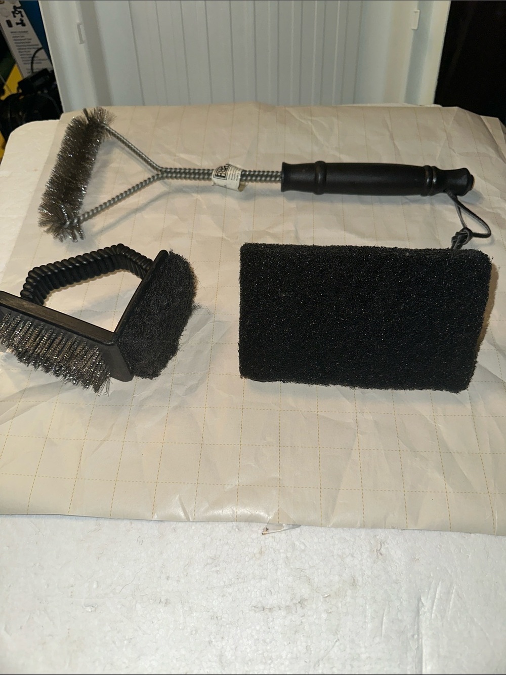 Three barbecue grill cleaning tools